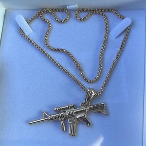 Betsey Johnson AR-15 riffle gun necklace